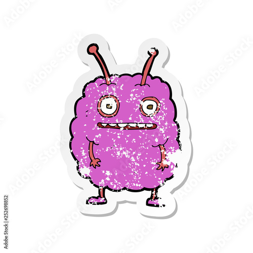 retro distressed sticker of a cartoon funny alien monster