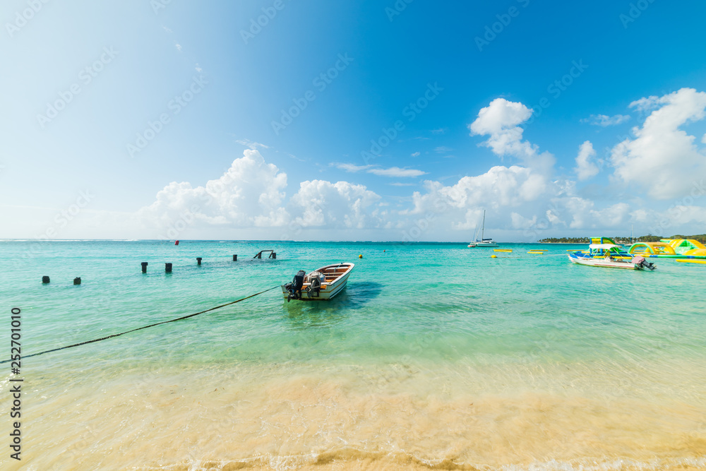 Moored boat in Sainte Anne beach in Guadeloupe island