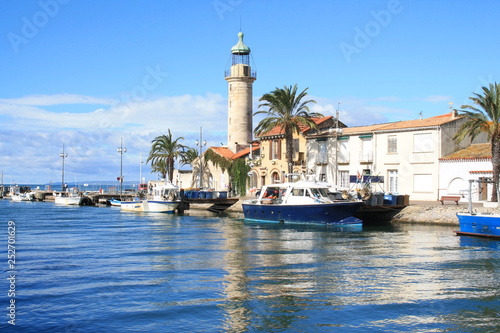 Lighthouse and old fishing port of Grau du roi in Camargue, a resort on the coast of Occitanie region in France