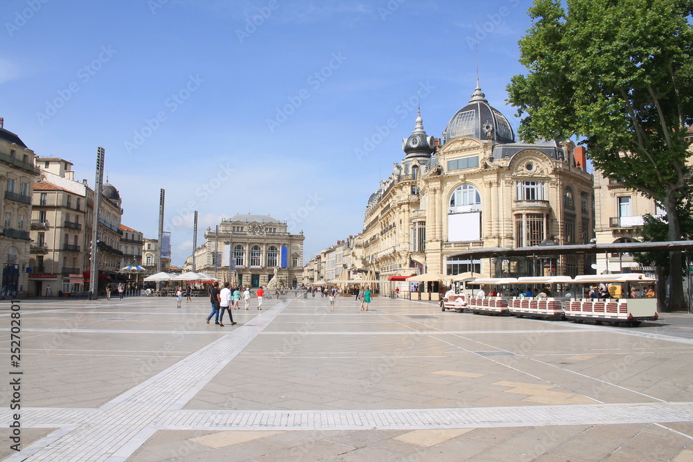 Fototapeta premium Comedy square in Montpellier, its opera and the three graces fountain, France