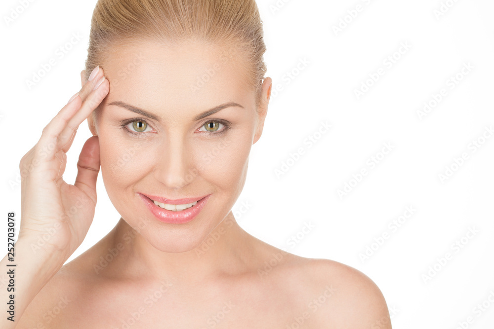 Graceful beauty. Cropped studio beauty shot of a smiling woman giving a confident look to the camera Graceful beauty. Cropped studio beauty shot of a smiling woman giving a confident look to the camera