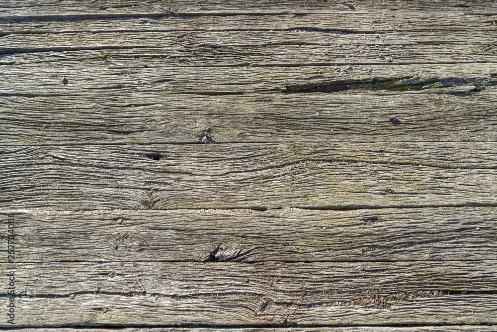 Old wooden rotten surface as a background or backdrop Old wooden rotten surface as a background or backdrop