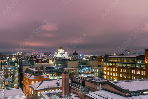 Aerial view to the iluminated city center of Moscow at night time. Christ the Savior Cathedral
