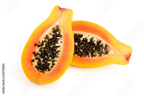 half of ripe papaya isolated on a white background