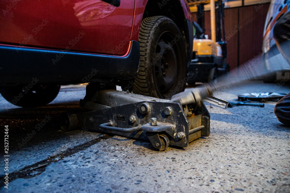 Fototapeta premium Tire replacement service, fitting with balancing, change to winter