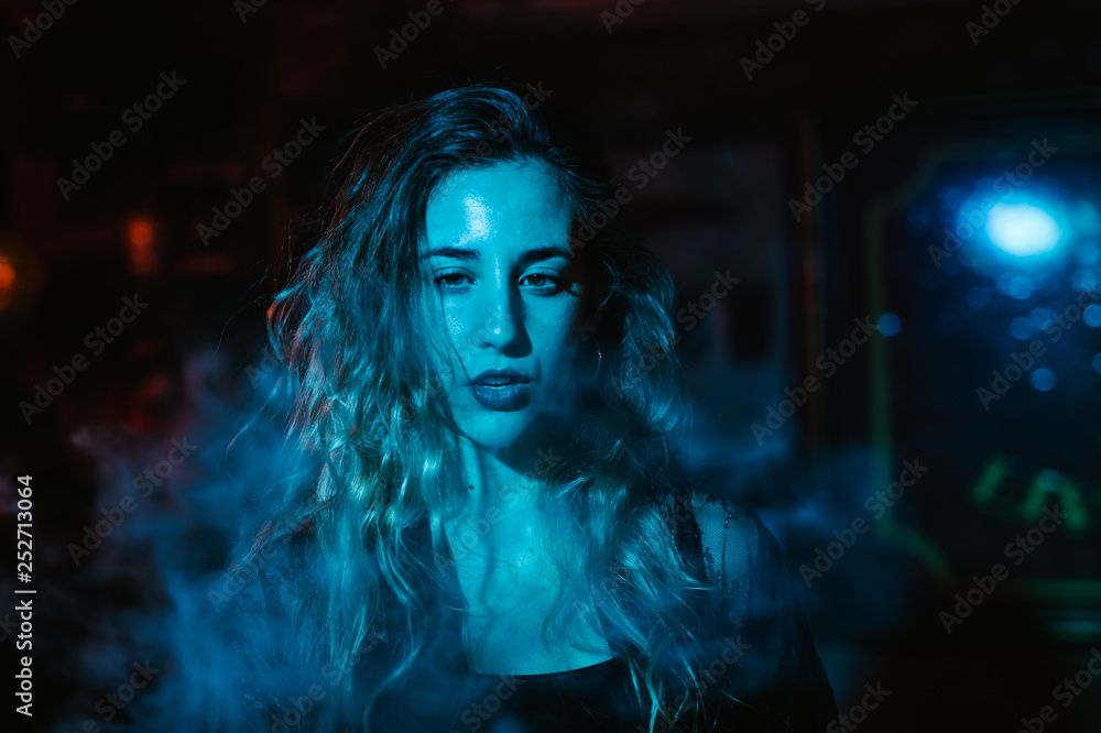 Young girl to vape in the disco Young girl to vape in the disco