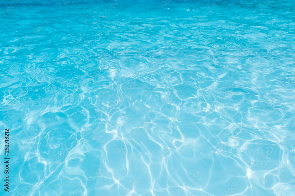 Blue water in swimming pool for background and abstract, Beautiful ripple wave and motion in pool Blue water in swimming pool for background and abstract, Beautiful ripple wave and motion in pool