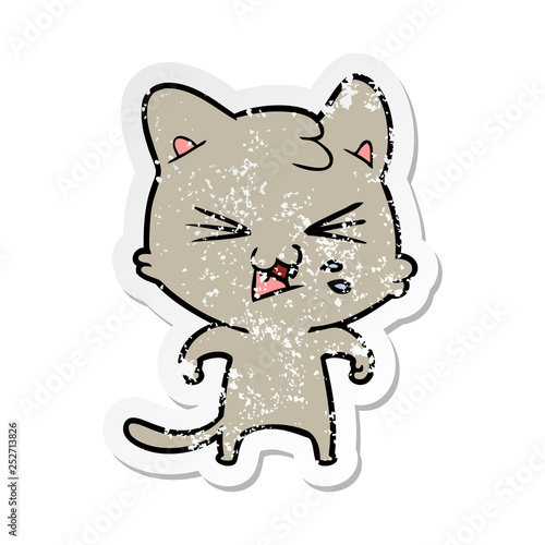 distressed sticker of a cartoon hissing cat