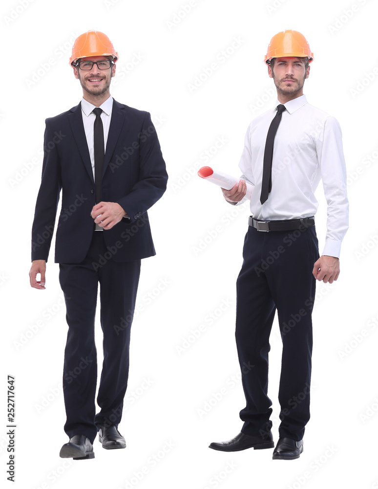 in full growth .successful architect engineer in orange helmet. in full growth .successful architect engineer in orange helmet.