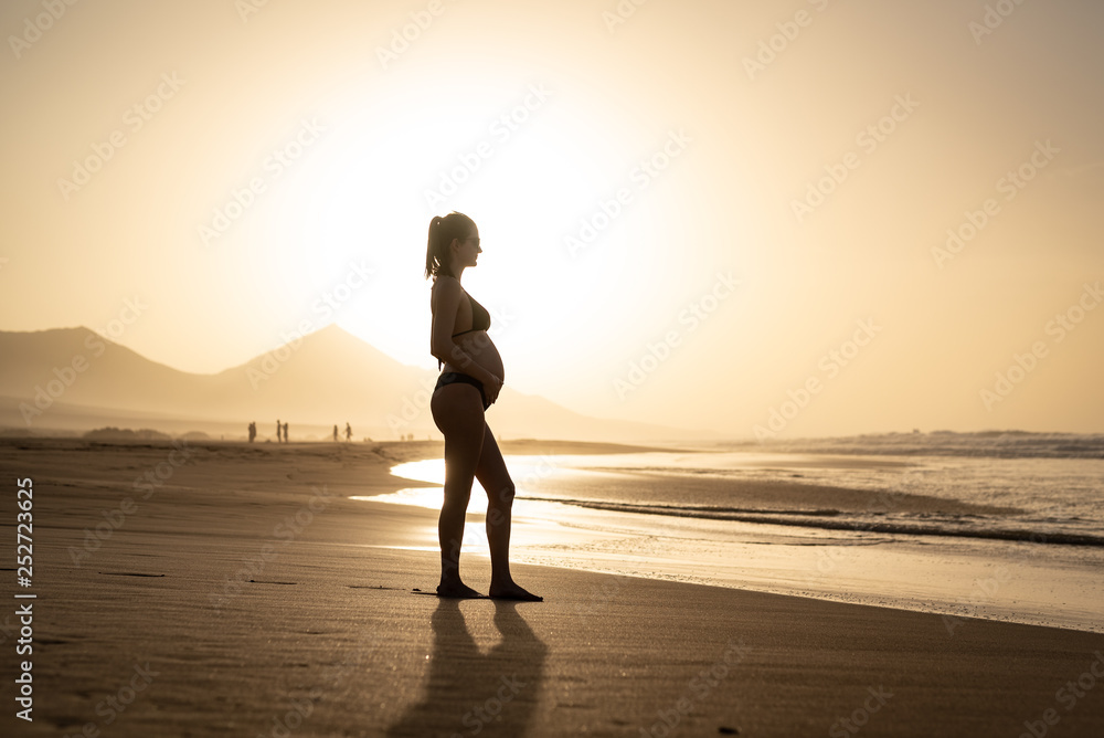 pregnant girl on the beach