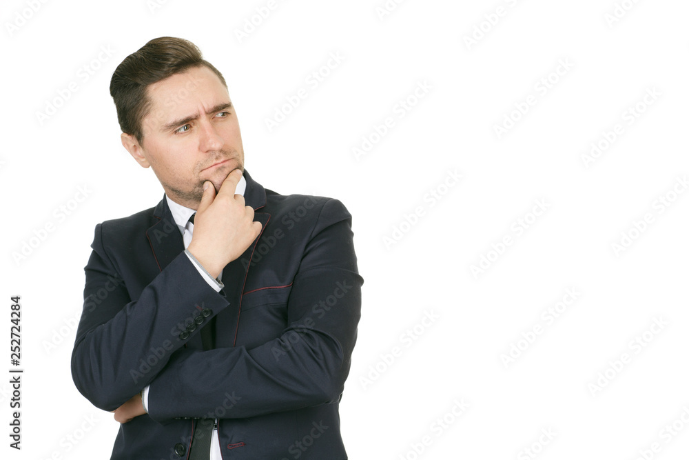 Hard decision. Horizontal studio shot of a mature businessman making a decision looking seriously at the copyspace on the side isolated on white Hard decision. Horizontal studio shot of a mature businessman making a decision looking seriously at the copyspace on the side isolated on white