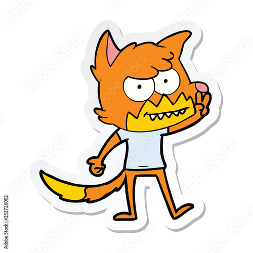 sticker of a cartoon grinning fox