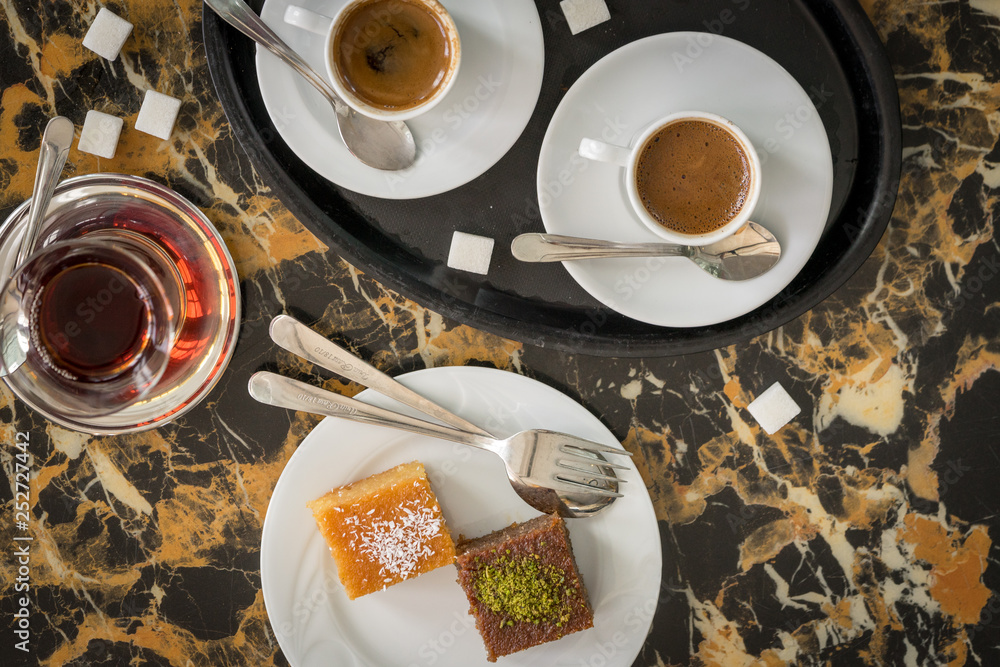 traditional Turkish red black tea tulip glass green flowers sweet dessert afternoon tea break
