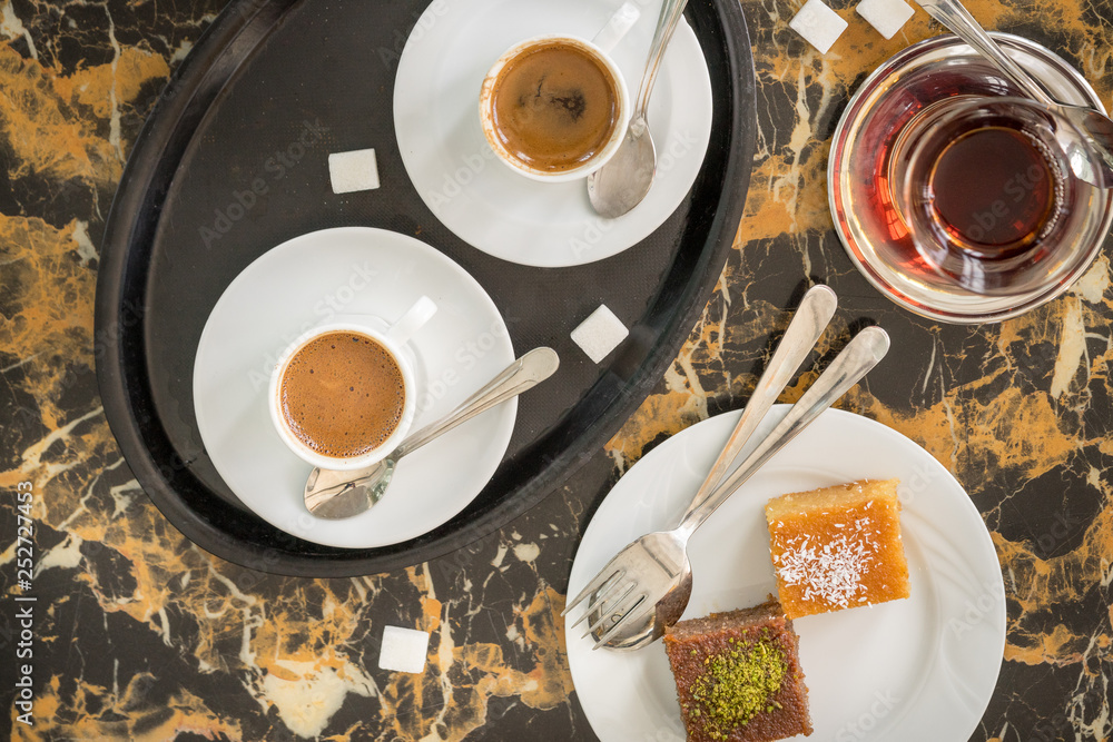 traditional Turkish red black tea tulip glass green flowers sweet dessert afternoon tea break