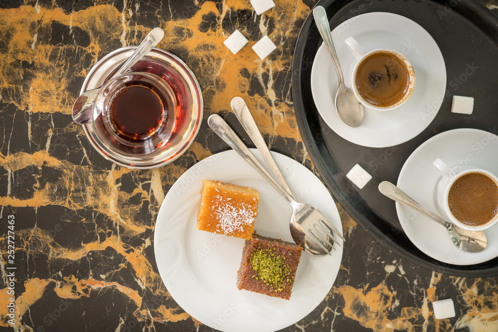 traditional Turkish red black tea tulip glass green flowers sweet dessert afternoon tea break