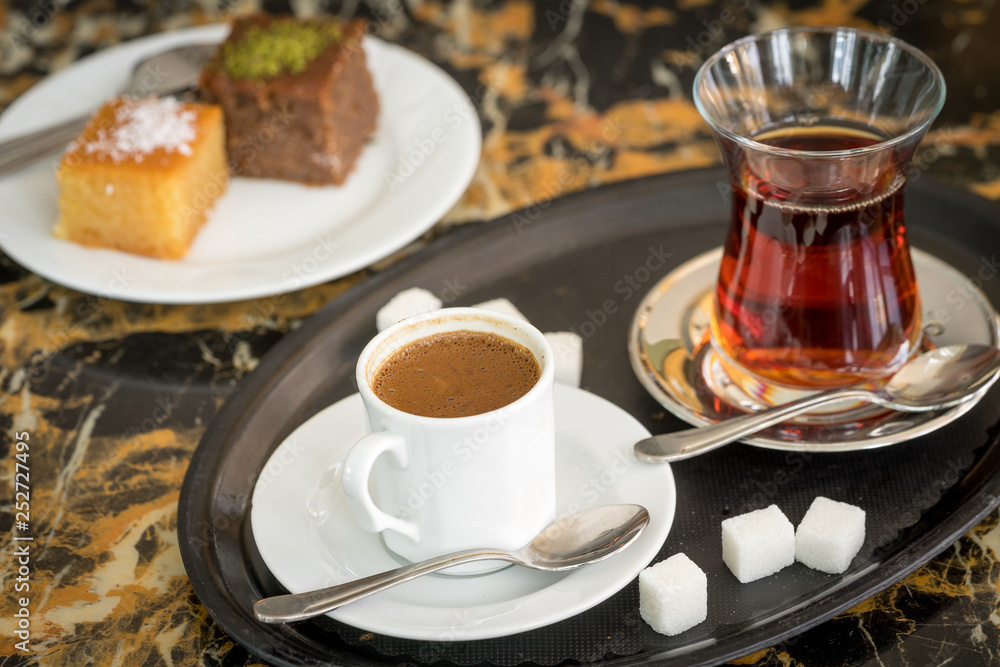 traditional Turkish red black tea tulip glass green flowers sweet dessert afternoon tea break