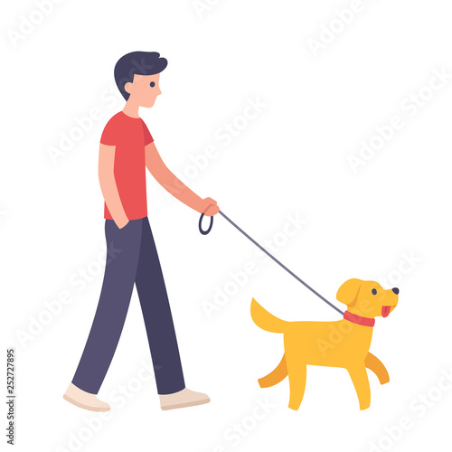 Boy walking dog