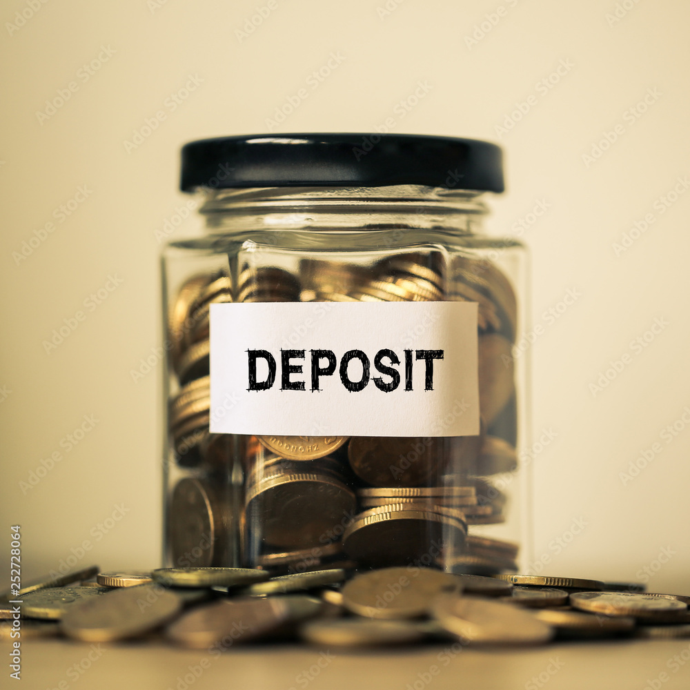 Deposit Concept Glass Jar With Coins Inside Deposit Concept Glass Jar With Coins Inside