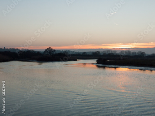 Beautiful countryside Dedham water scene outside nature landscape space © Callum