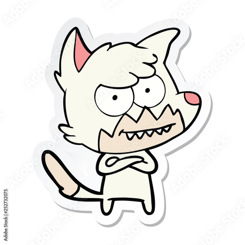 sticker of a cartoon grinning fox