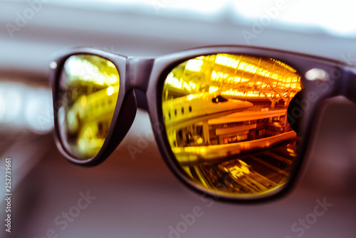 Airplane Reflection In Sunglasses