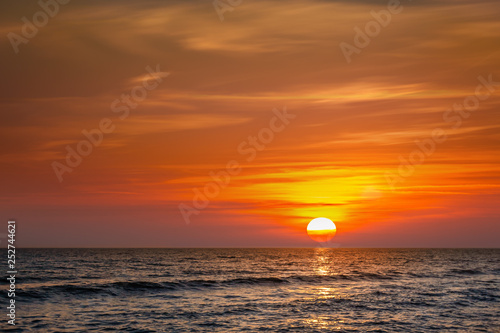 Sun at sunset on a mediterranean sea