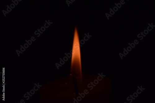 Candle Light flame close up With black background