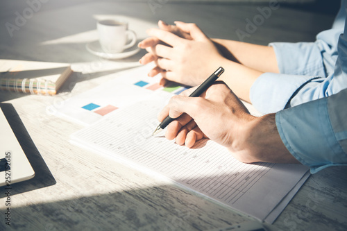 team working in graph in office desk