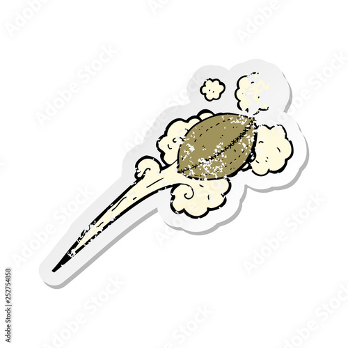retro distressed sticker of a cartoon thrown football