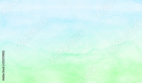 Gradient hand drawn illustration. Abstract pastoral lansdcape blue and green shades watercolor background. Wet effect aquarelle paint paper textured canvas for design, grunge card, vintage template  © KatMoy