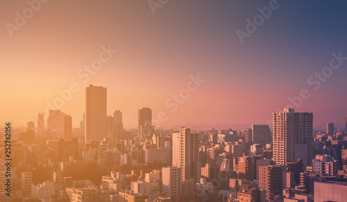 Blur image for background : skyline cityscape at sunset