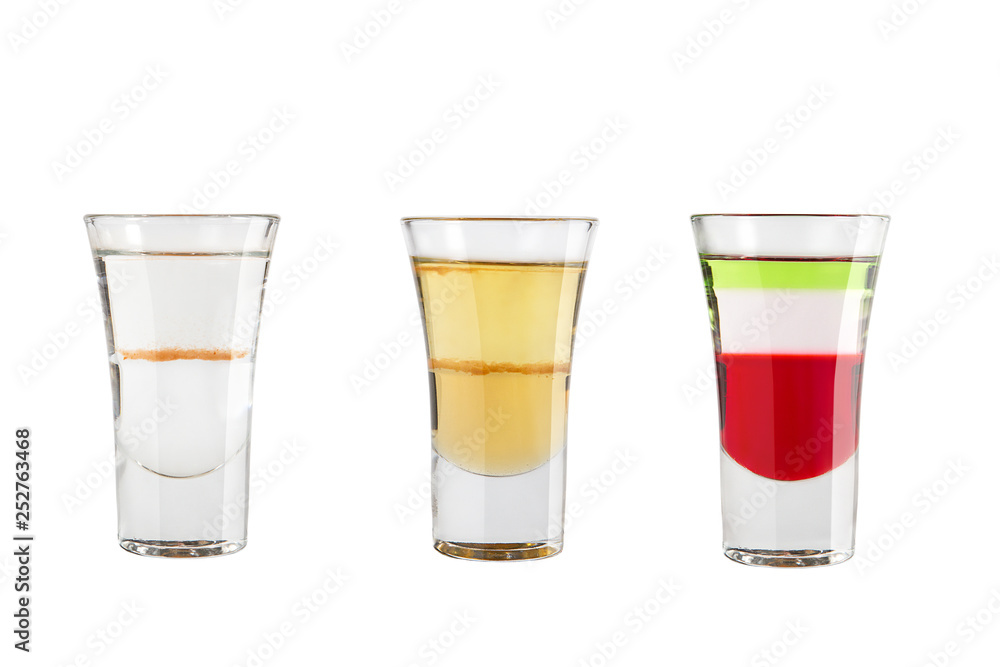 Set of alcohol shots on a white background. Three shots are popular. Set of alcohol shots on a white background. Three shots are popular.