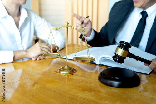 Lawyer or judge gavel with balance work with client