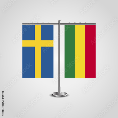 Table stand with flags of Sweden and Bolivia.Two flag. Flag pole. Symbolizing the cooperation between the two countries. Table flags