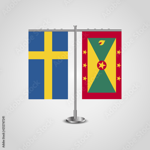 Table stand with flags of Sweden and Grenada.Two flag. Flag pole. Symbolizing the cooperation between the two countries. Table flags