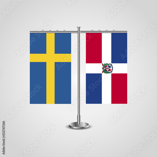 Table stand with flags of Sweden and Dominican Republic.Two flag. Flag pole. Symbolizing the cooperation between the two countries. Table flags