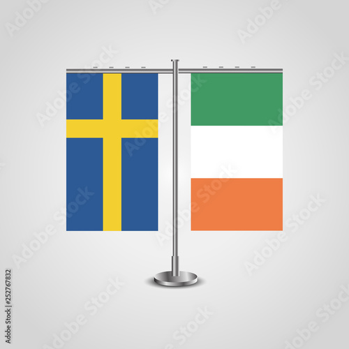 Table stand with flags of Sweden and Ireland.Two flag. Flag pole. Symbolizing the cooperation between the two countries. Table flags