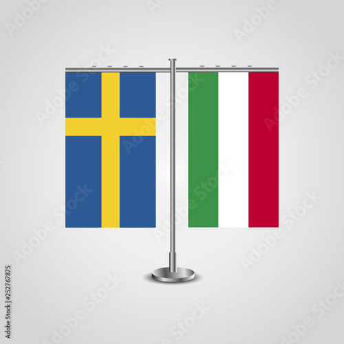Table stand with flags of Sweden and Hungary.Two flag. Flag pole. Symbolizing the cooperation between the two countries. Table flags
