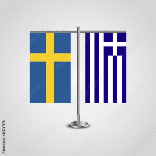 Table stand with flags of Sweden and Greece.Two flag. Flag pole. Symbolizing the cooperation between the two countries. Table flags