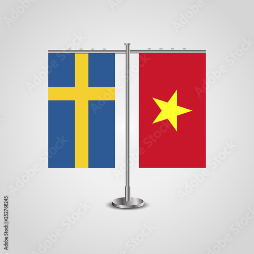 Table stand with flags of Sweden and Vietnam.Two flag. Flag pole. Symbolizing the cooperation between the two countries. Table flags