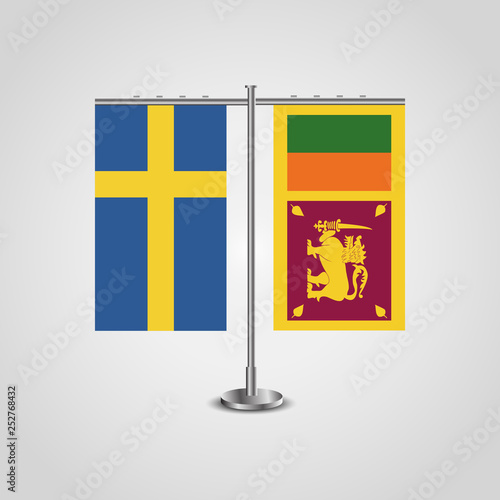 Table stand with flags of Sweden and Sri Lanka.Two flag. Flag pole. Symbolizing the cooperation between the two countries. Table flags