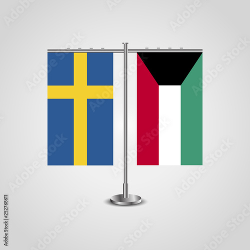 Table stand with flags of Sweden and Kuwait.Two flag. Flag pole. Symbolizing the cooperation between the two countries. Table flags