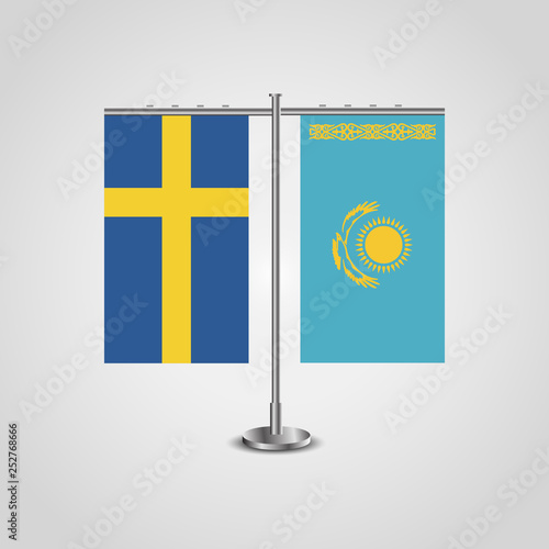 Table stand with flags of Sweden and Kazakhstan.Two flag. Flag pole. Symbolizing the cooperation between the two countries. Table flags