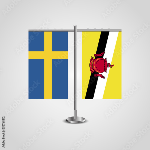 Table stand with flags of Sweden and Brunei.Two flag. Flag pole. Symbolizing the cooperation between the two countries. Table flags