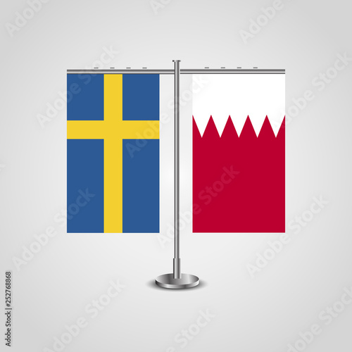 Table stand with flags of Sweden and Bahrain.Two flag. Flag pole. Symbolizing the cooperation between the two countries. Table flags