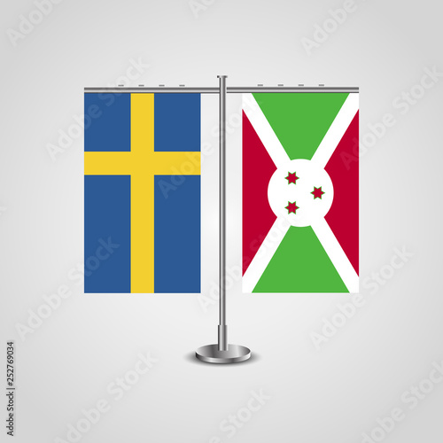 Table stand with flags of Sweden and Burundi.Two flag. Flag pole. Symbolizing the cooperation between the two countries. Table flags