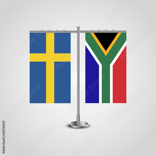 Table stand with flags of Sweden and South Africa.Two flag. Flag pole. Symbolizing the cooperation between the two countries. Table flags