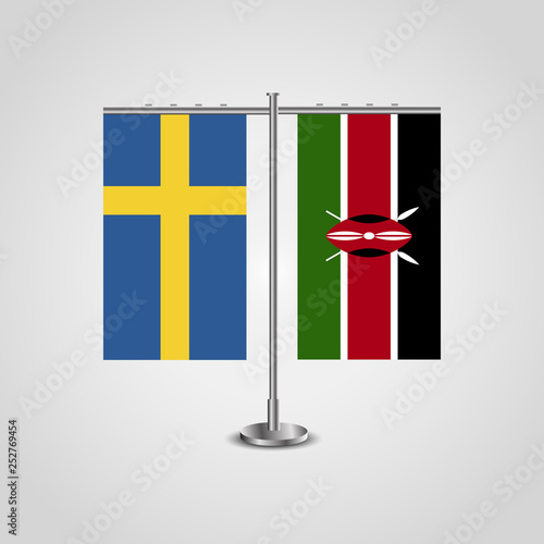 Table stand with flags of Sweden and Kenya.Two flag. Flag pole. Symbolizing the cooperation between the two countries. Table flags