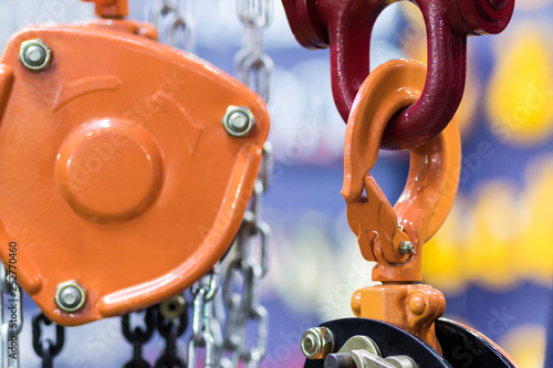 orange hook for industrial crane ; equipment background