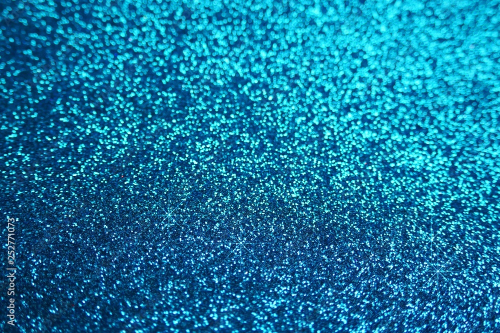 Glitter shiny wallpaper. Glitter blue iridescent macro background with